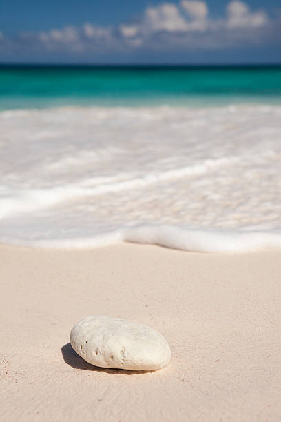 istock Close-up of a Stone on the white sand beach 154924307
