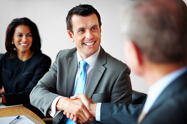 istock Two business man shaking hands in a meeting 154924493