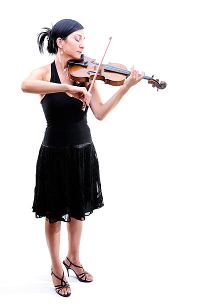 彼女のバイオリン奏者がバイオリンを演奏 - violinist ストックフォトと画像