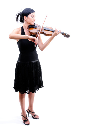 Beautiful young woman playing violin