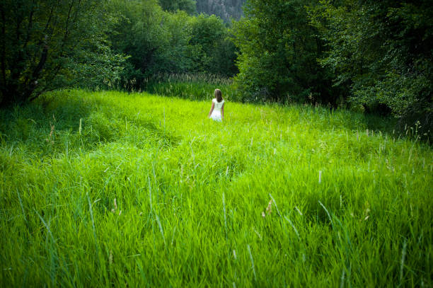 Sustainable lifestyle and environmental concepts. Female strength and freedom. Woman's fashion in nature.