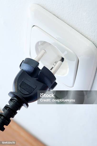 Black Plug And White Socket Stock Photo - Download Image Now - Plugging In, Electric Plug, Electrical Outlet