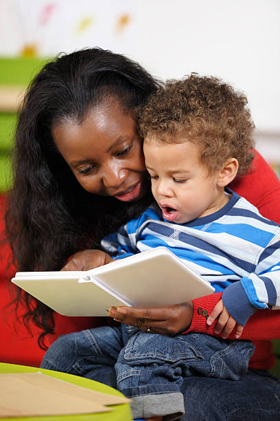 istock Expressive Toddler Enjoying Storytime With Carer 154925538