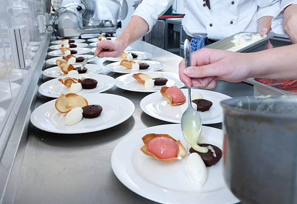 istock chefs preparing dessert in restaurant kitchen XXXL image 154925773