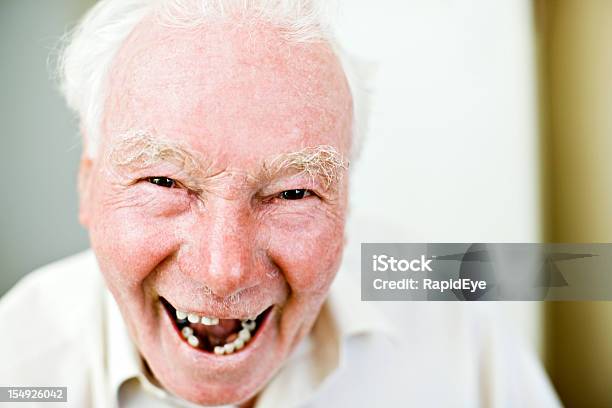 Old Man With Missing Teeth Smiles Happily Stock Photo - Download Image Now - Gap Toothed, Men, Adult