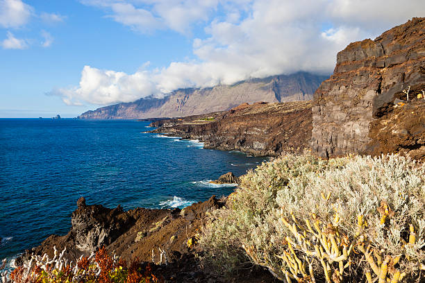 The volcanic island of El Hierro offers scenic and impressive views, with its imposing mountain range and the lava flows that reach the ocean. This is an image of El Golfo at sunset. El Hierro is a member of UNESCO's world network of Biosphere Reserves. Canary Islands, Spain. Canon EOS 5D Mark II