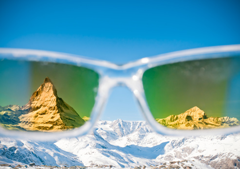 Looking at bright snow and the peak of the Matterhorn in Switzerland through skiing sunglasses.