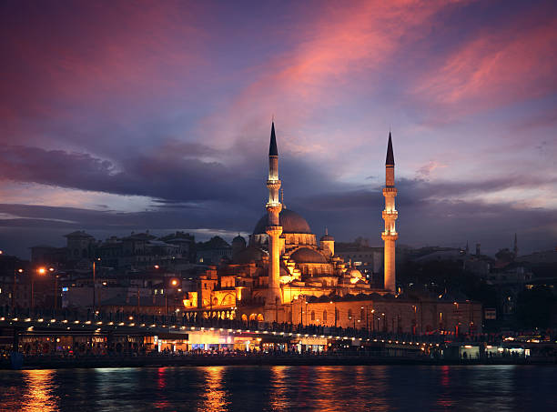 The New (Yeni Cami) Mosque, the Galata Bridge and Bosphorus Strait in the Eminönü district of Istanbul, Turkey. SEE MORE photos from Turkey:  http://www.oc-photo.net/FTP/icons/istanbul.jpg
