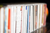 Row of CDs on shelf