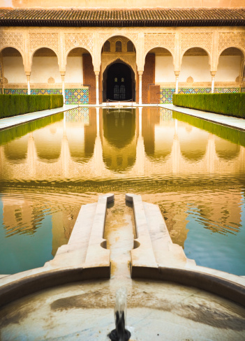 Pond in Nasrid Palace - part of Alhambra complex in Granada, Spain.
