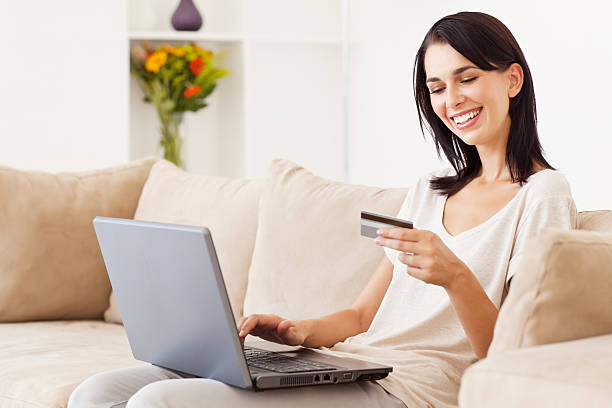 istock Young Woman Shopping Online 154927097