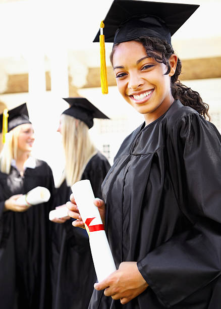 istock Beautiful female graduate with degree 154927176