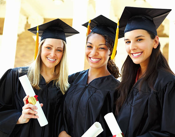 istock Friends celebrating their graduation with diplomas 154927190
