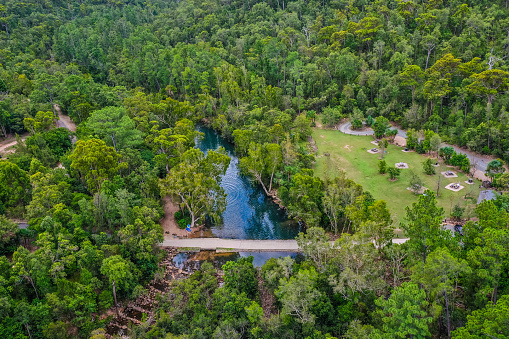 Aerial view of Upper Stony Creek, Byfield, Central Queensland, Australia, showing creek picnic area and floodway crossing the Byfield National Park and green blue creek,