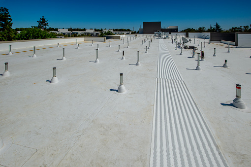 Membrane flat roof for an apartment complex.