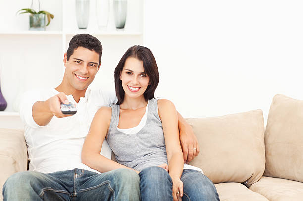 istock Attractive Couple Watching TV 154930149
