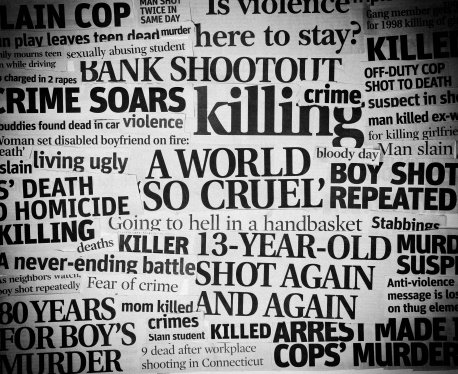 A  grungy, grainy black and white collage made up of newspaper clippings pertaining to topic of the violence and crime found in the world