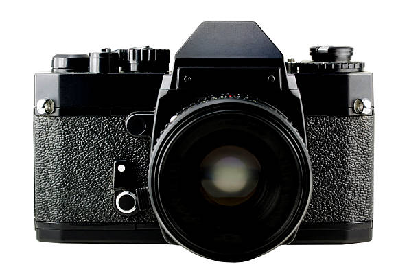 Classic Manual 35mm Camera Isolated on White Classic Film SLR 35 mm Camera isolated on a white background. 35mm movie camera stock pictures, royalty-free photos & images