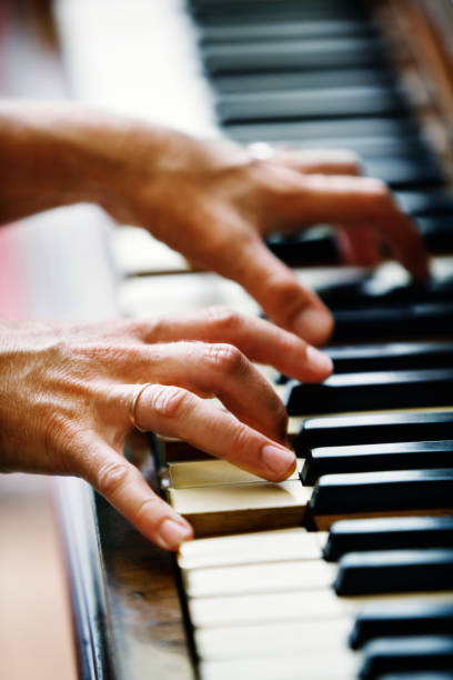 istock Hands playing antique German piano 154930851