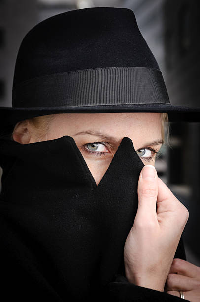 istock Beautiful Mysterious Woman wearing Hat and Coat 154930868