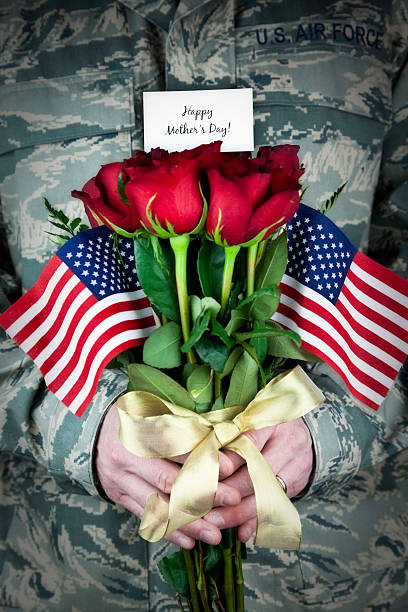 istock Soldier with Mother's Day Bouquet 154931110
