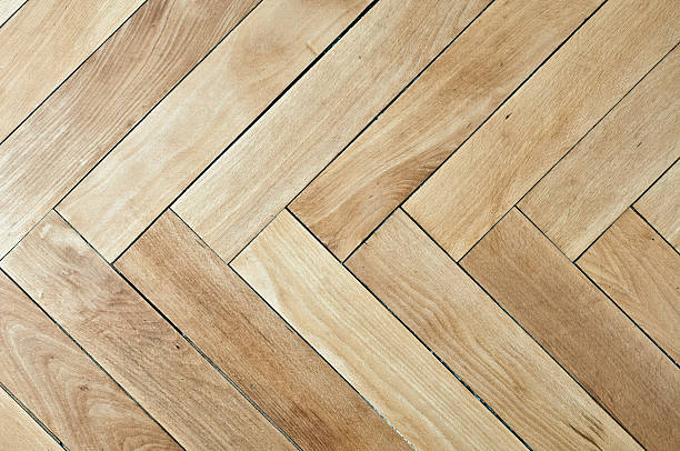 Vintage plain wooden parquet floor wooden parquet in herringbone design. the image is very sharp into all corners. MORE RELATED IMAGES HERE: herringbone stock pictures, royalty-free photos & images