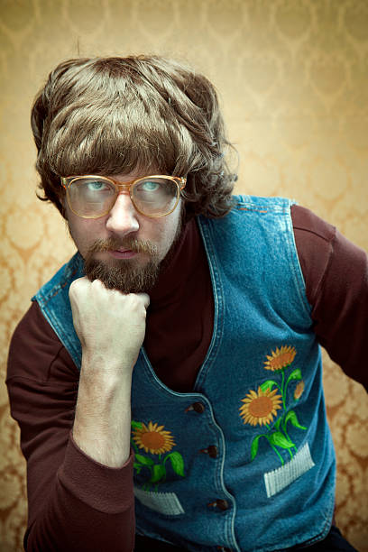 istock Goofy Hippy Professor with Hand Under Chin 154931553