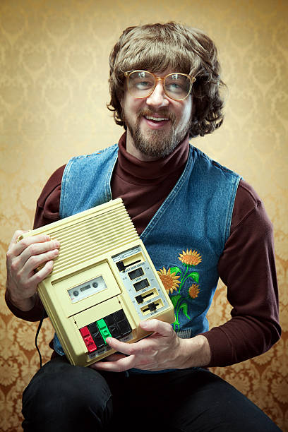 istock Goofy Hippy Professor with Cassette Tape Player 154931559