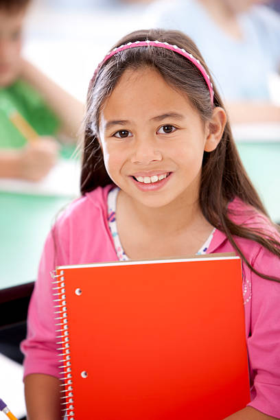 istock Education:  Mixed Race Girl in School Education Learning Studying 154931928