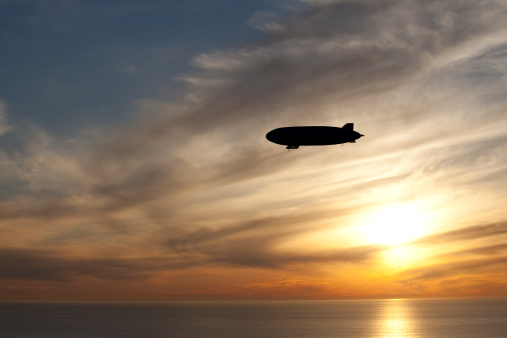 Frankfurt, Germany – September 24, 2021: An airship on a sightseeing flight over Frankfurt. The Zeppelin NT - New Technology - is developed and based in Friedrichshafen on Lake Constance.