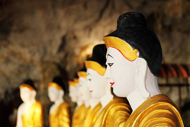 istock Buddha statue portraits in cave temple 154932655