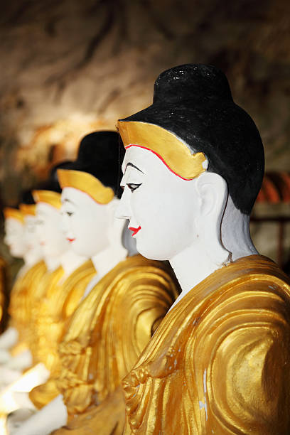 istock buddha portraits in cave temple 154932685