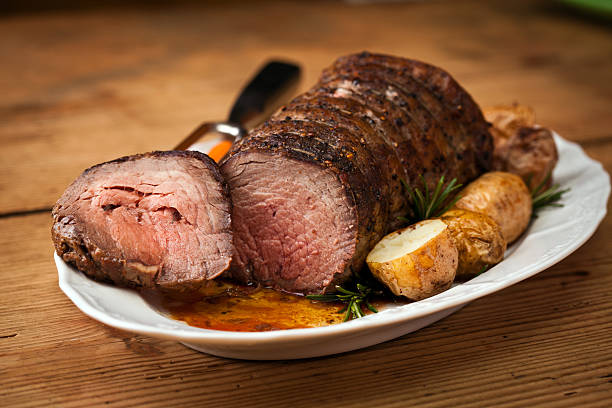 carne de res asada - roast beef fotografías e imágenes de stock