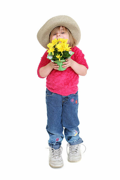 istock Big Shoe Children: Little girl peeking over flowerpot 154933285