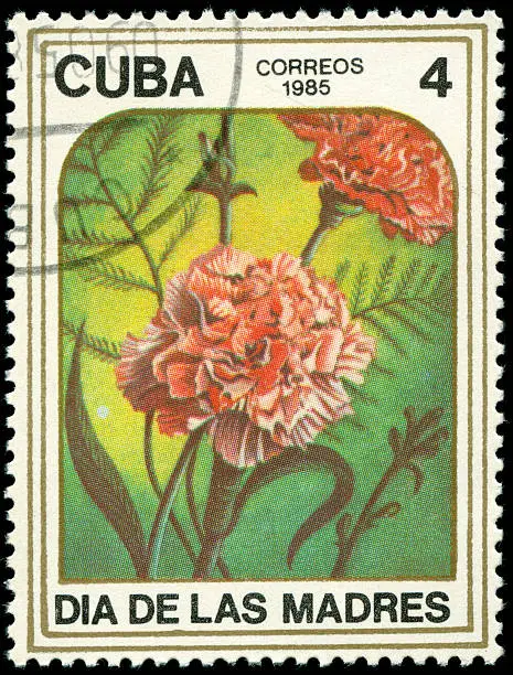Cancelled stamp from Cuba scanned on black background. In aRGB colorspace for optimal printing.