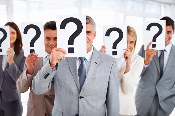 istock Business people standing with question mark on boards 154933614