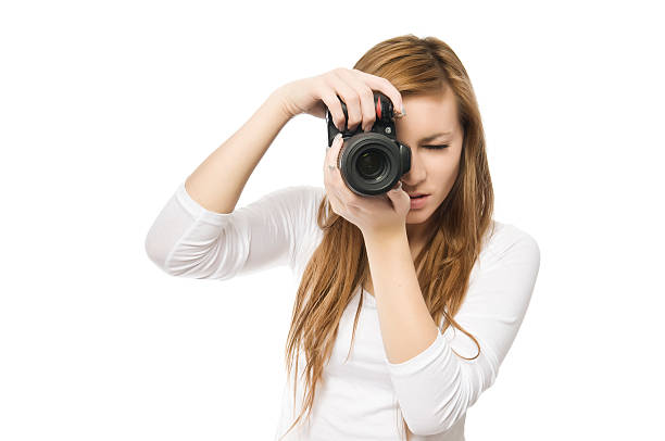istock Click! - Young female photographer is shooting you 154933780