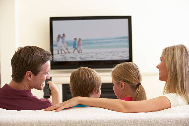 istock Family Watching Widescreen TV At Home 154933794