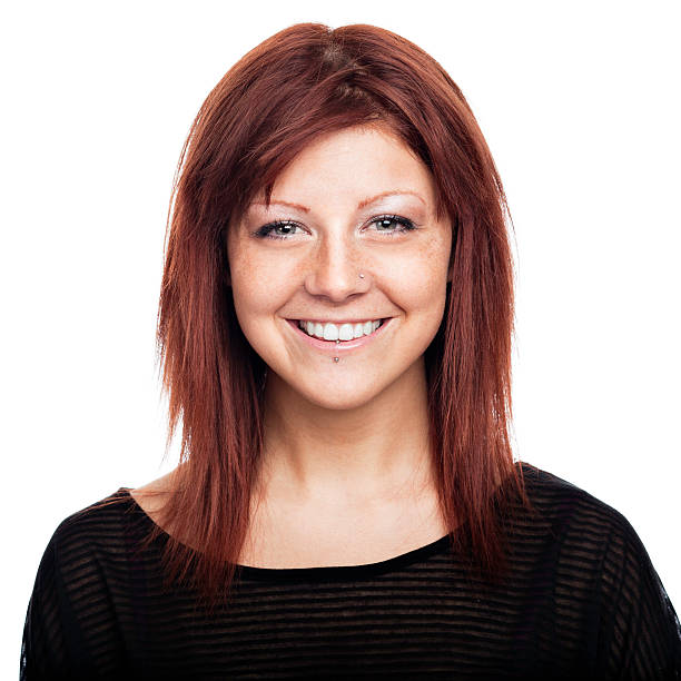istock Vibrant young red head woman smiling 154933940