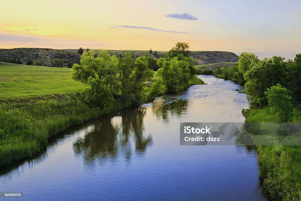 peaceful sunset stream in rural Montana this file must be re-assigned to the proPhoto color profile and then viewed in that profile. River Stock Photo