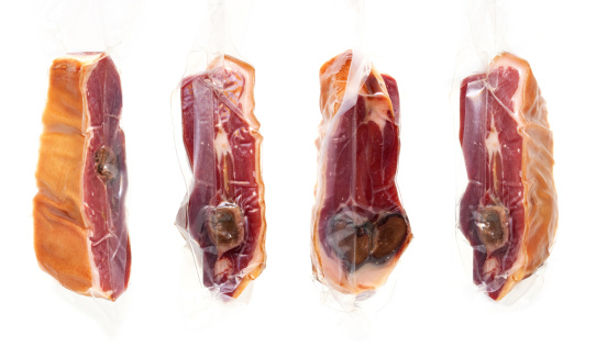 Packaged Chinese bacon, isolated on white background. 