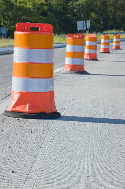istock Orange Barrels in Highway Maintenance, Repair, Construction Zone 154934346