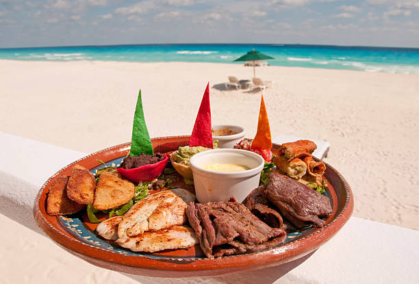 A plate of authentic Mexican food served up al a carte on the beach.