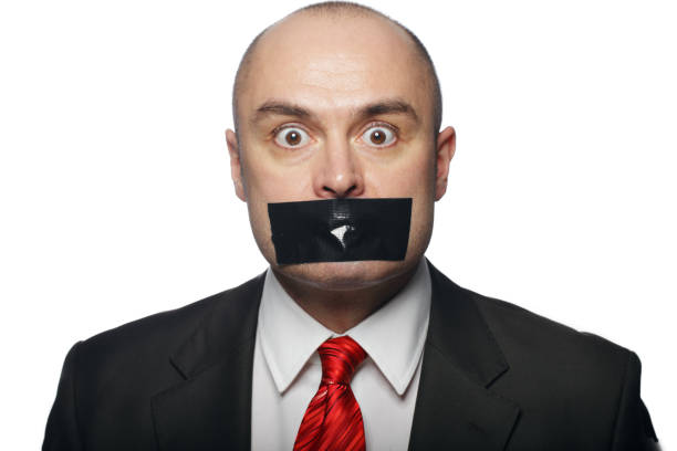 istock Business Man with Tape over Mouth 154934486