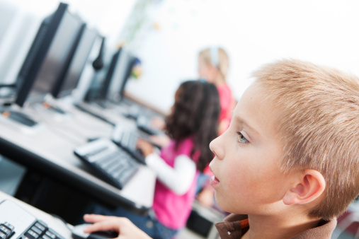 Group of children in a computer class
