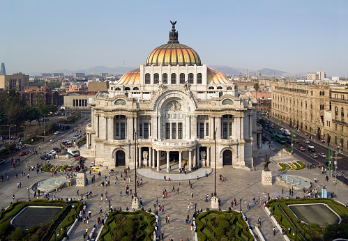 Late afternoon at the Palacio de Bellas Artes (Spanish for Palace of Fine Arts). Mexico City's main opera and theatre house. A extravagant marble neoclassical structure inaugurated in 1934. Mexico City, Mexico.