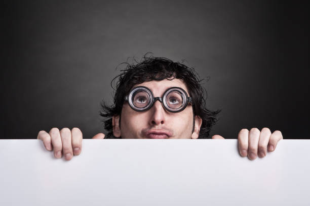 istock Potrait of a  curious young man with glasses. 154935199