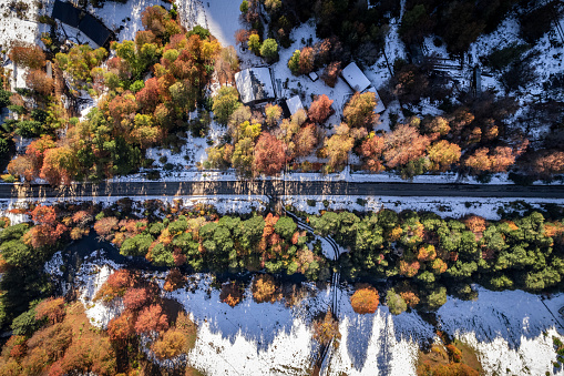 Aerial view of a snowy road at autumn in La Araucania region, southern Chile