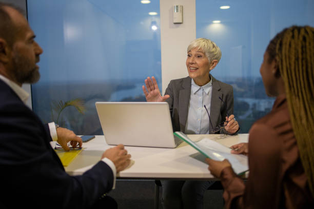 istock Business colleagues having a conversation 1549409828