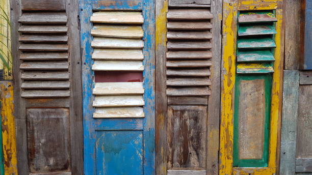 istock Deteriorated wooden cabinet doors 1549416379